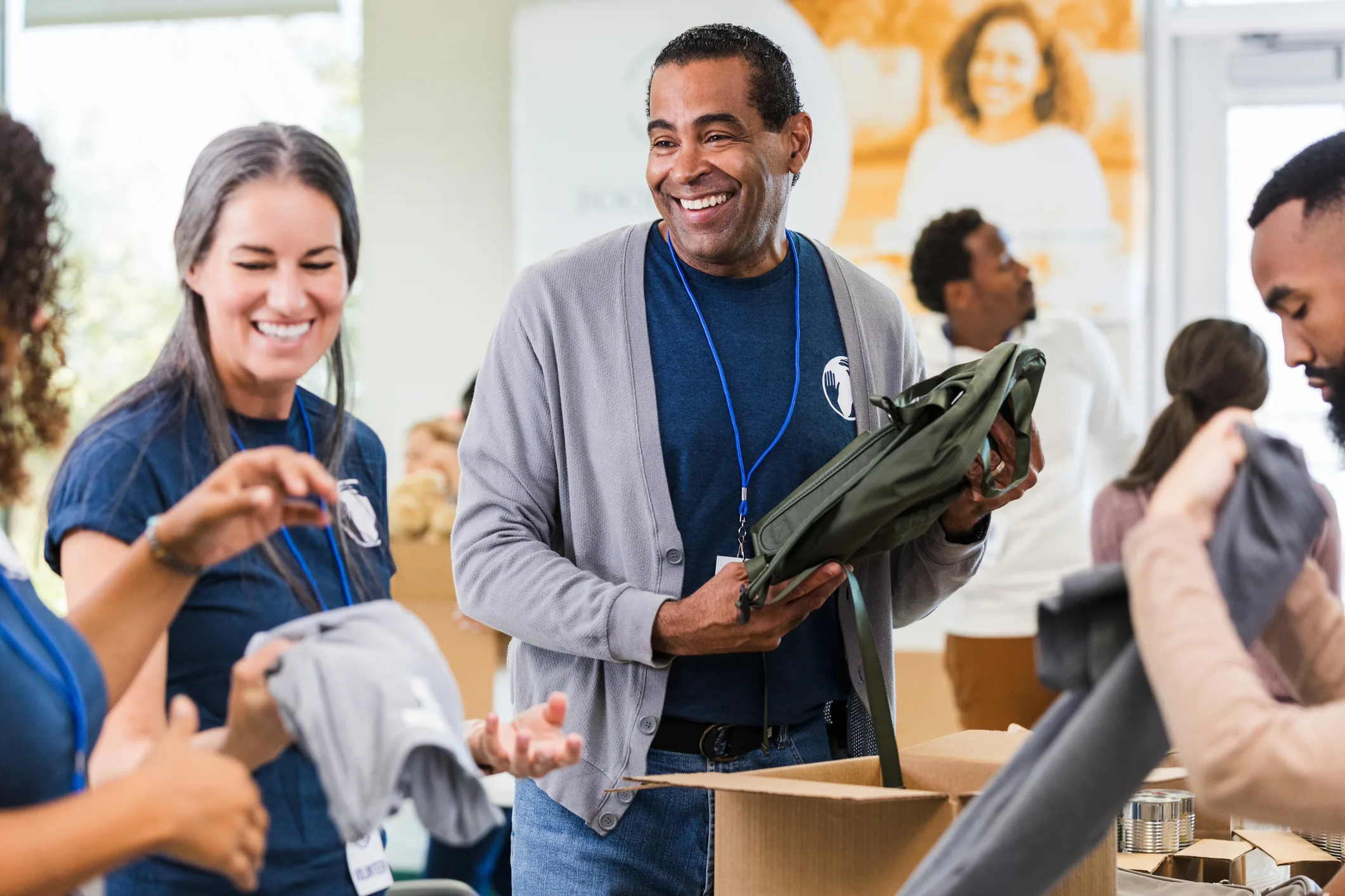 Middle-aged black man volunteering at a donation center
